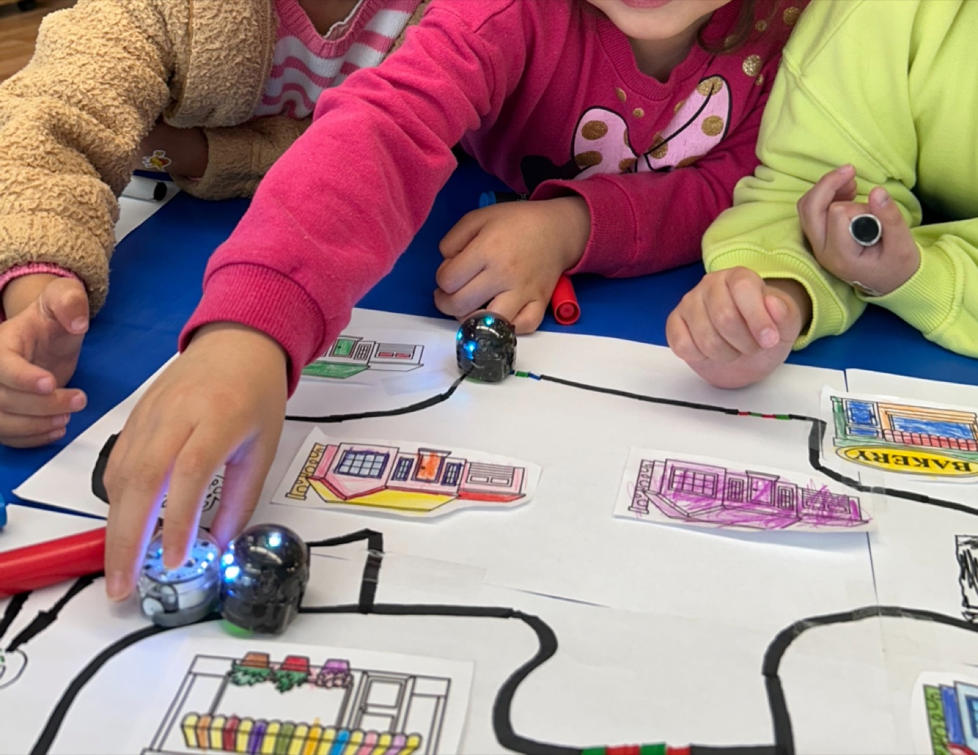 A student's hands-on robotics build in Ms. Ji's Robo Rookies class